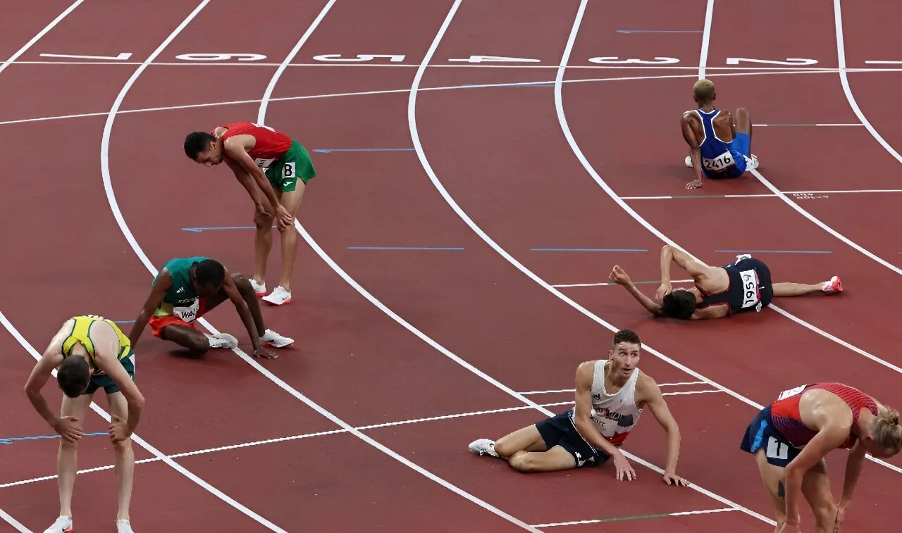 image of track and field athletes exhausted