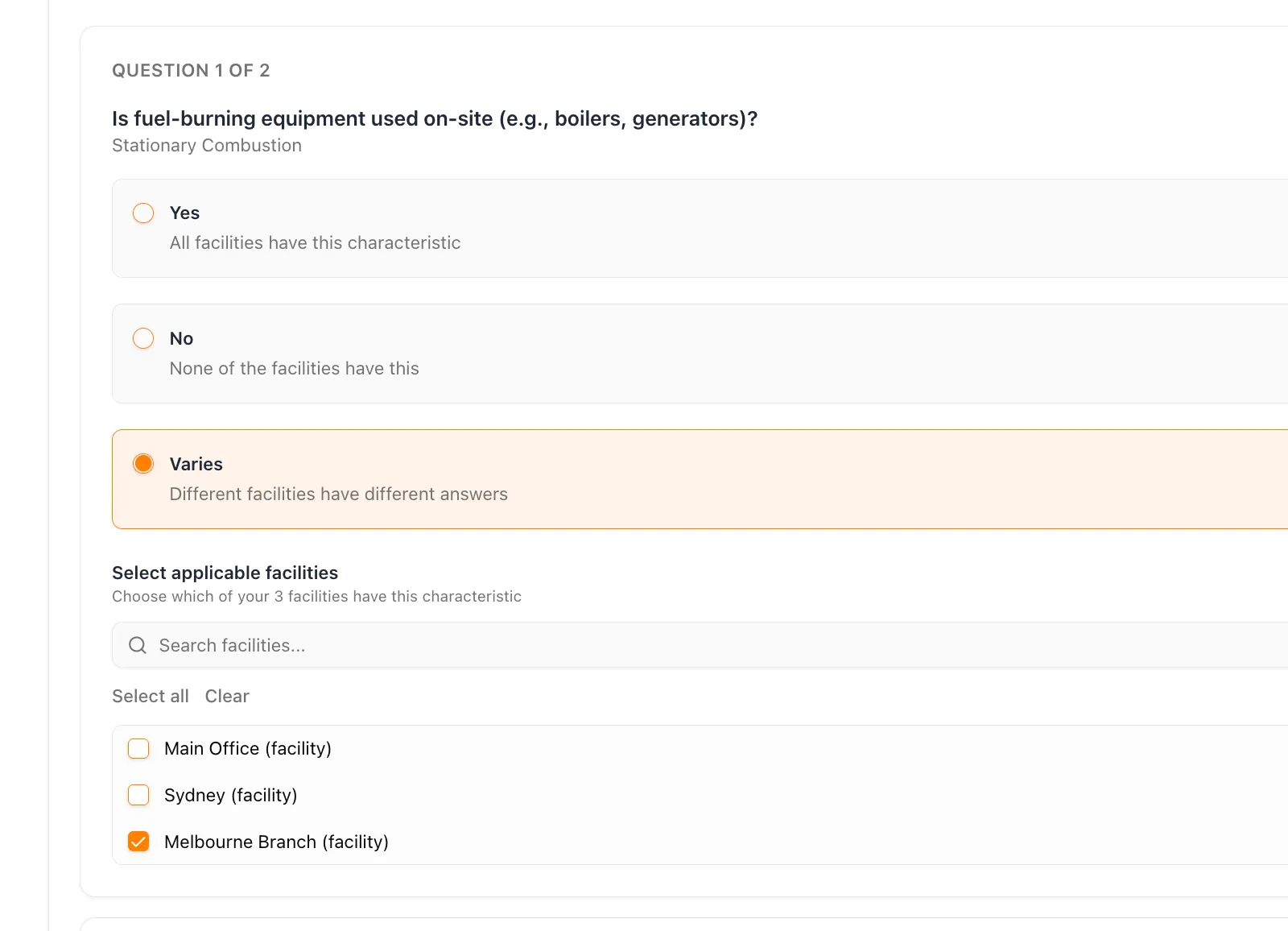 Emission boundary facility selector showing select-all capability with per-facility configuration for stationary combustion equipment